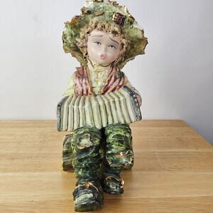 Capodimonte Boy with‎ Accordion Figurine Italy Hand Painted Sitting on Log Green
